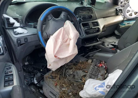 2010 Honda Odyssey Exl z USA, uszkodzony, nr VIN 5FNRL3H75AB061042